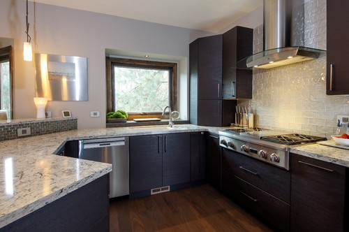 Cambria Praa Sands Countertop with Dark Cabinets and Textured Glass Subway Tiles